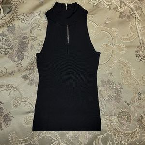 Women's Black Sleeveless High neck with front peephole and rear zipper closure.
